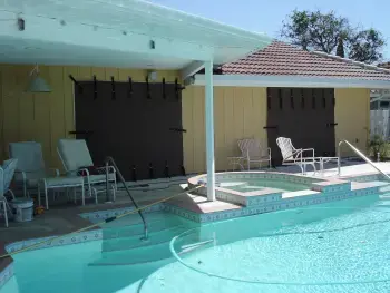 EZMax removable hurricane screen installed over doors in a Florida home