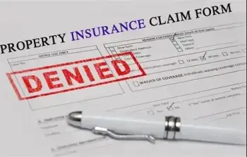 Insurance paperwork showing claim denials